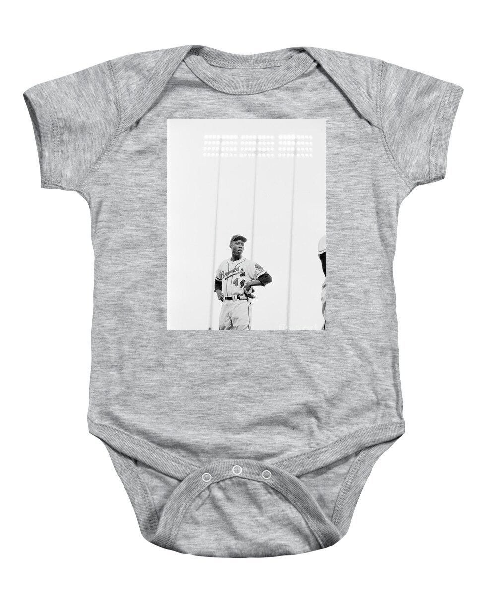 Hank Aaron Baby Onesie featuring the photograph Hank Aaron on the field, 1958 by The Harrington Collection
