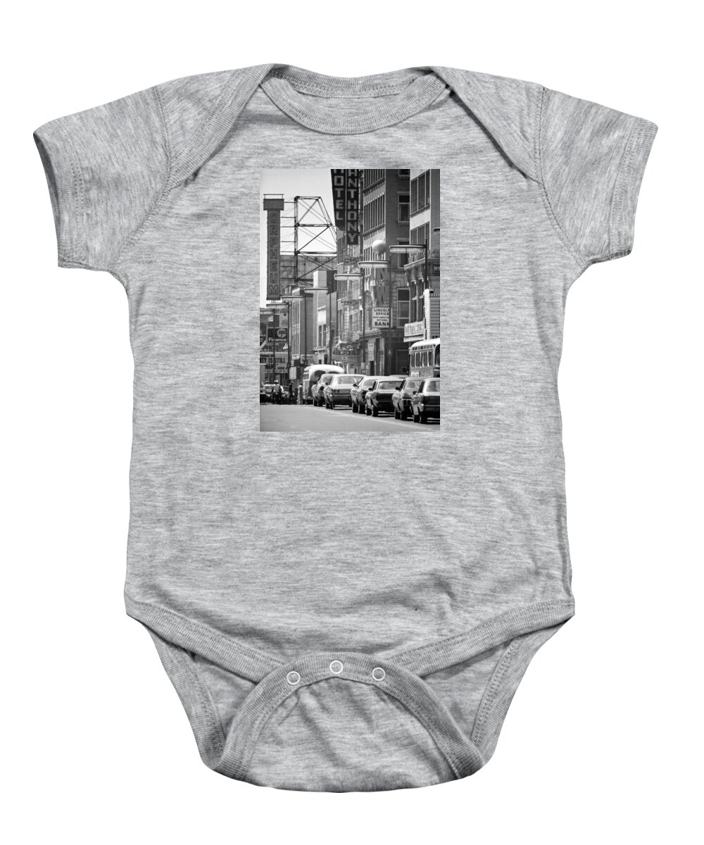 Book Work Baby Onesie featuring the photograph Hennepin and the Orpheum by Mike Evangelist