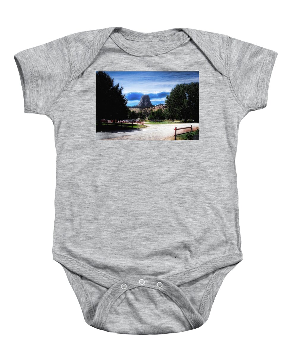 National Monument Baby Onesie featuring the photograph KOA Devils Tower Wyoming by Thomas Woolworth