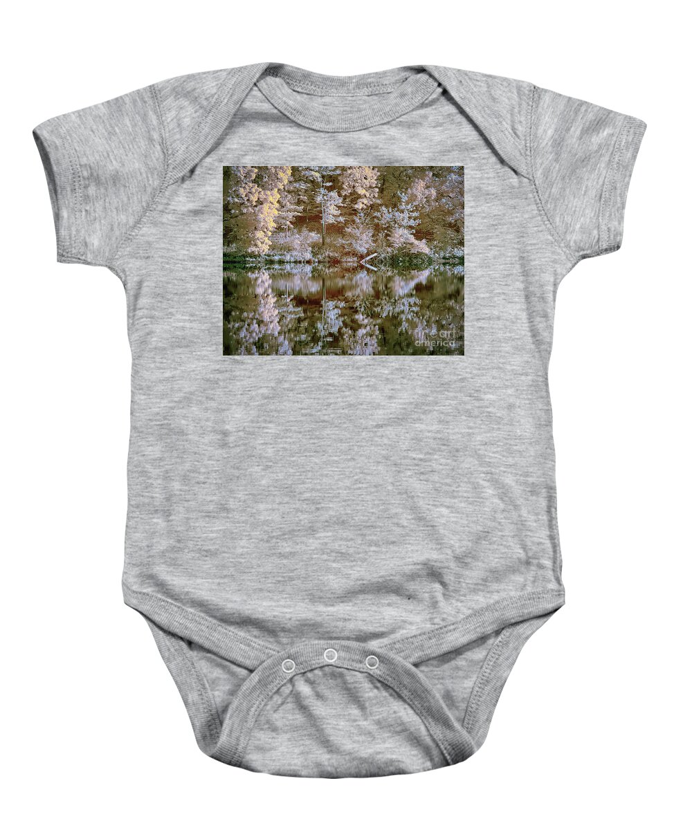 Needwood Baby Onesie featuring the photograph Lake reflection IR faux color by Izet Kapetanovic
