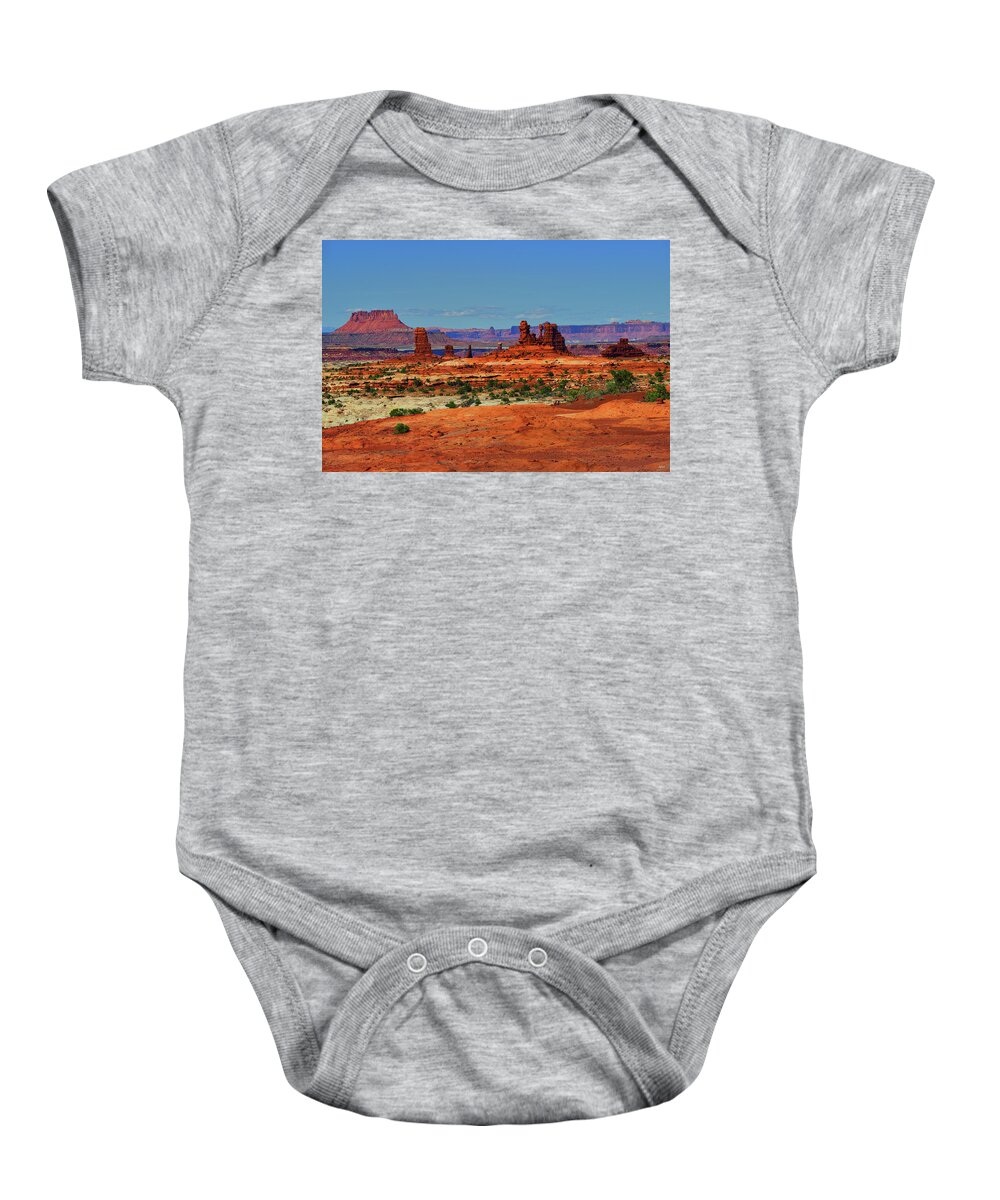 The Maze Baby Onesie featuring the photograph Land of Standing Rocks by Greg Norrell