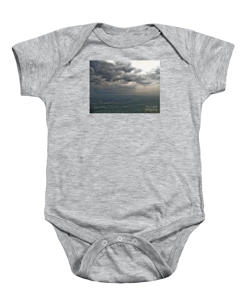 May Skies Over North America Baby Onesie featuring the photograph May Skies Over North America by Paddy Shaffer