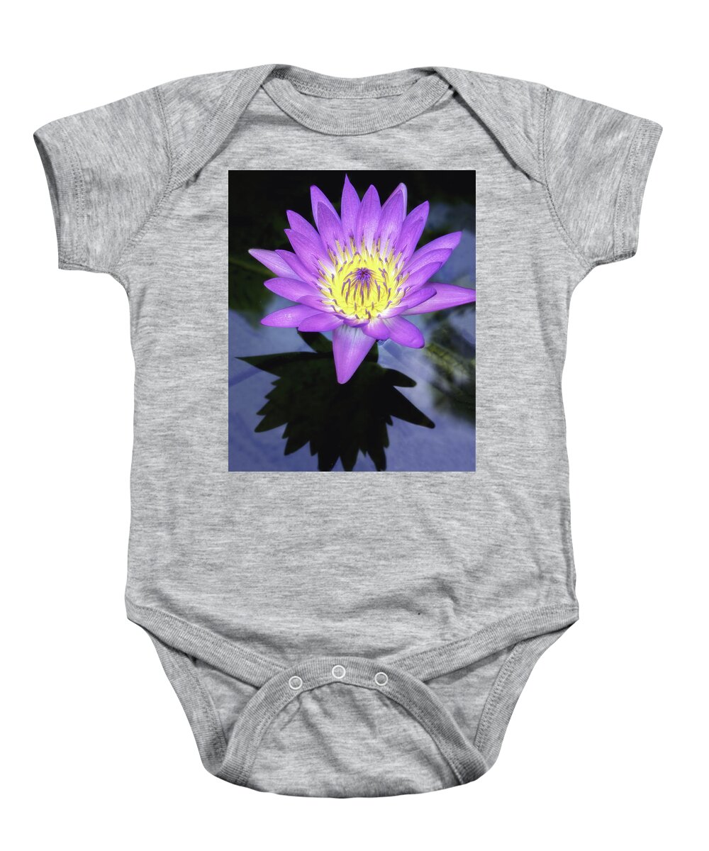Aquatic Baby Onesie featuring the photograph Beautiful reflection of waterlily in a pond. by Usha Peddamatham