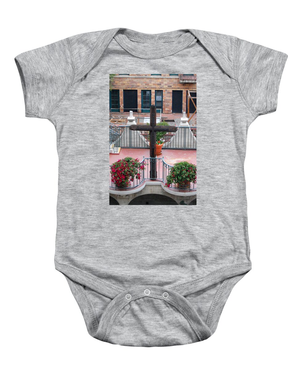 Mission Inn Baby Onesie featuring the photograph Mission Inn Cross by Amy Fose