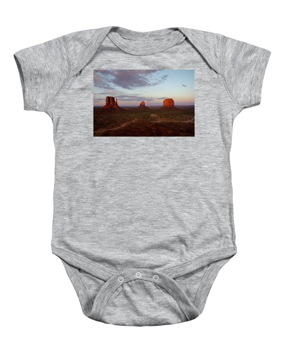 Monument Valley Baby Onesie featuring the photograph Monumental Sunset by Gales Of November