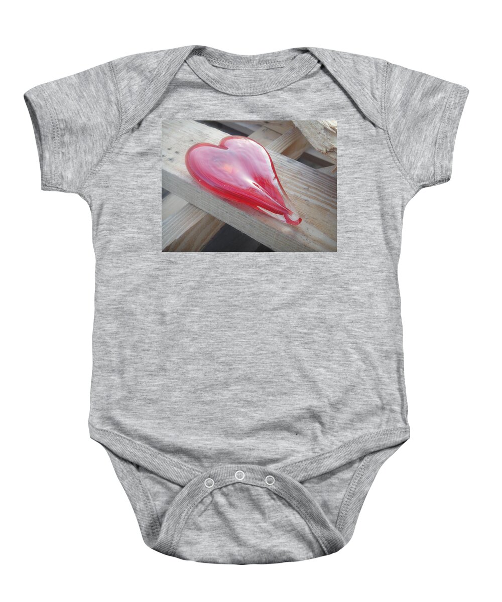 Wood Baby Onesie featuring the photograph My hearts on a pile of wood by WaLdEmAr BoRrErO