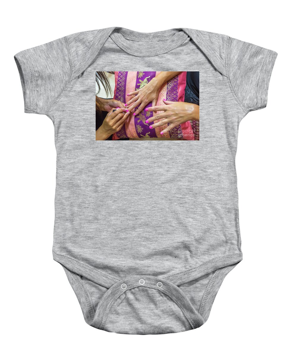 Nail Baby Onesie featuring the photograph Nail polish application by Benny Marty