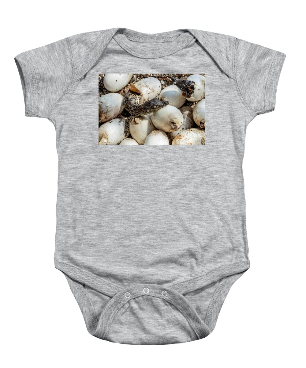 Danger Baby Onesie featuring the photograph Welcome to the world by Arik Baltinester