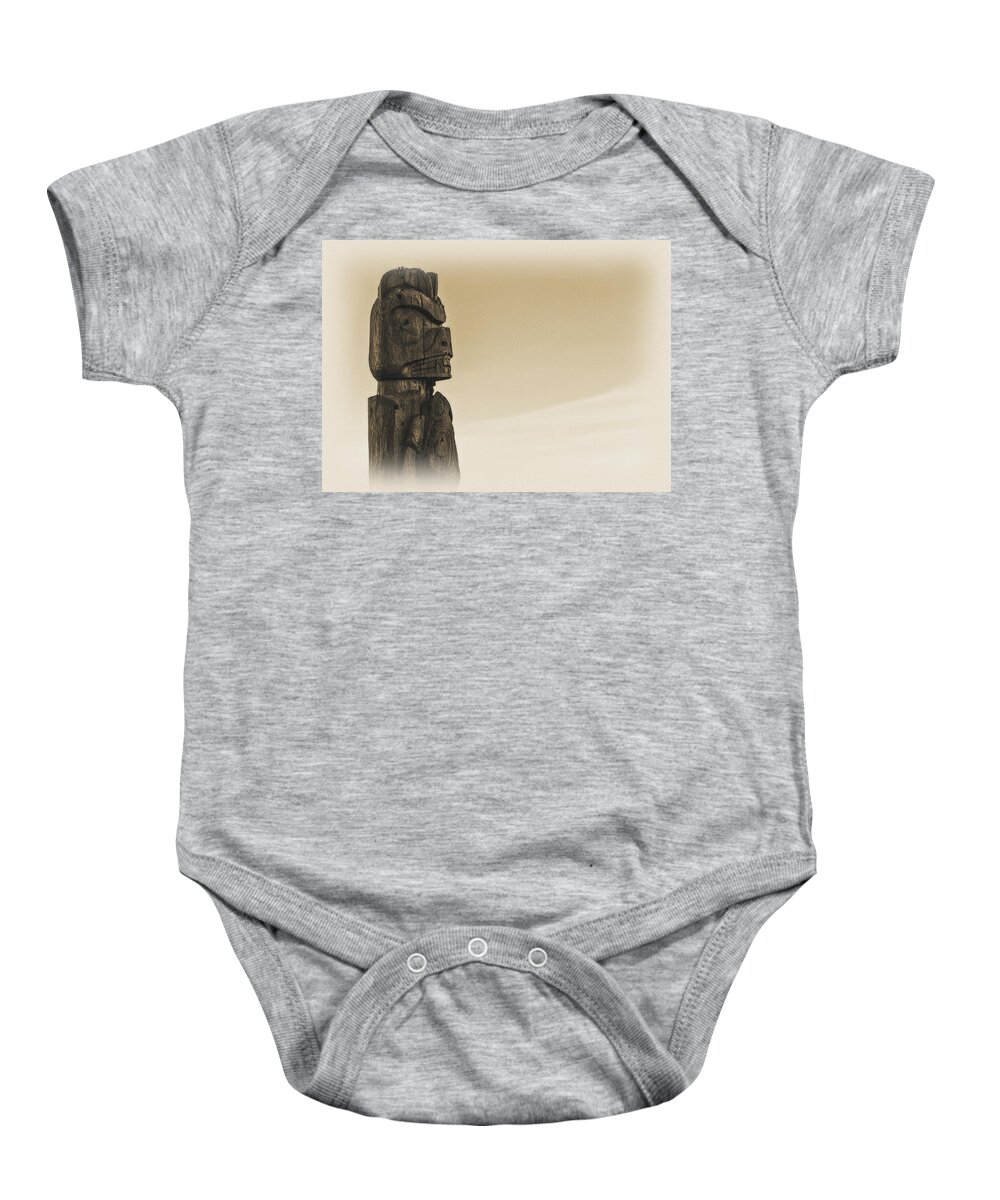 Sign Baby Onesie featuring the photograph Pacific Northwest Totem Pole Old Yellow by Pelo Blanco Photo
