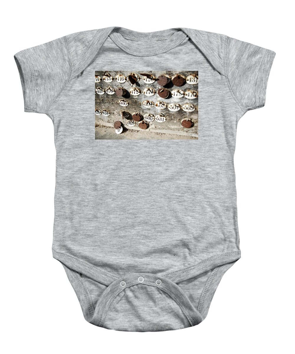 Abandoned Baby Onesie featuring the photograph Plates with Numbers by Carlos Caetano