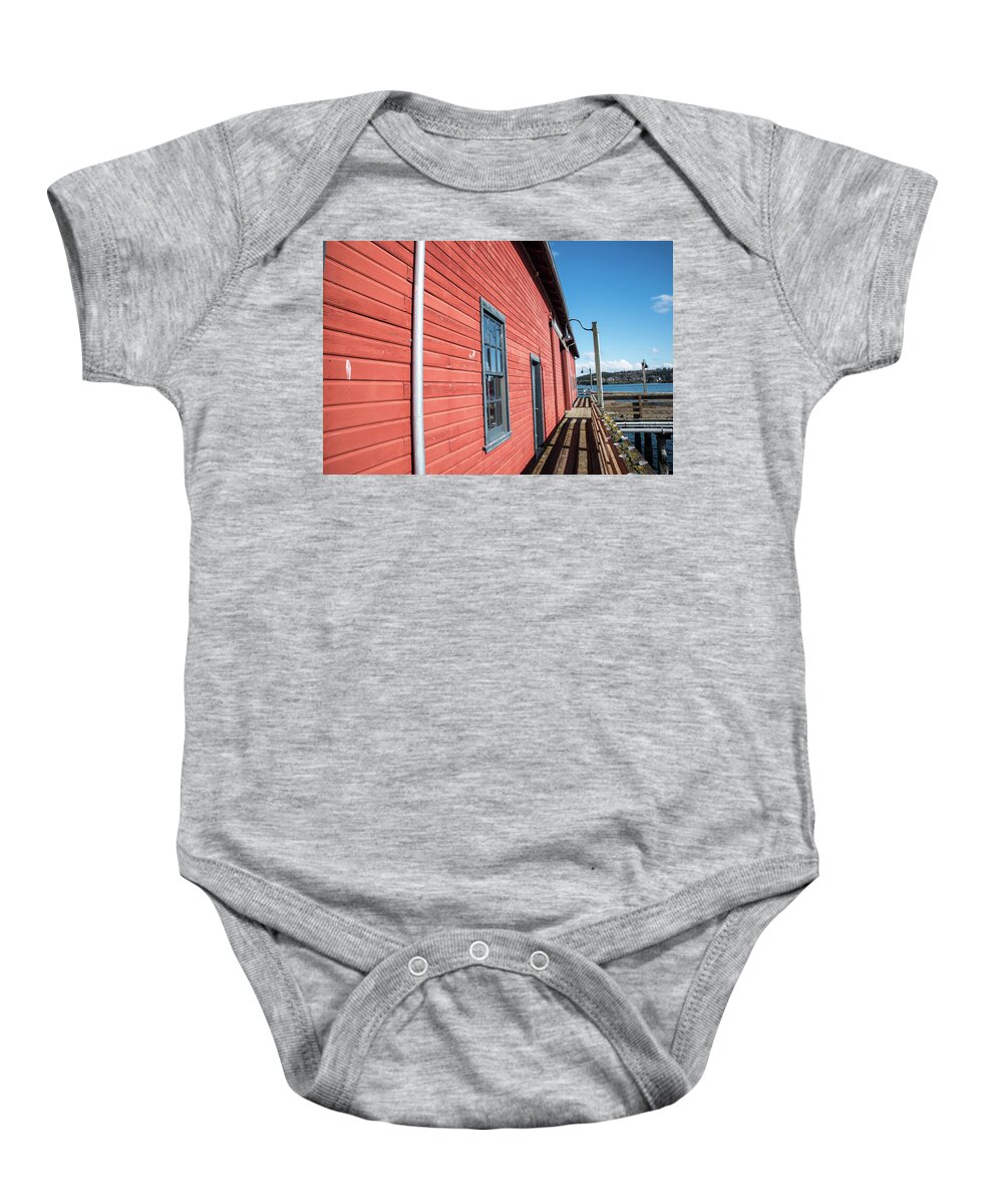Red Wall At Coupeville Wharf Baby Onesie featuring the photograph Red Wall at Coupeville Wharf by Tom Cochran