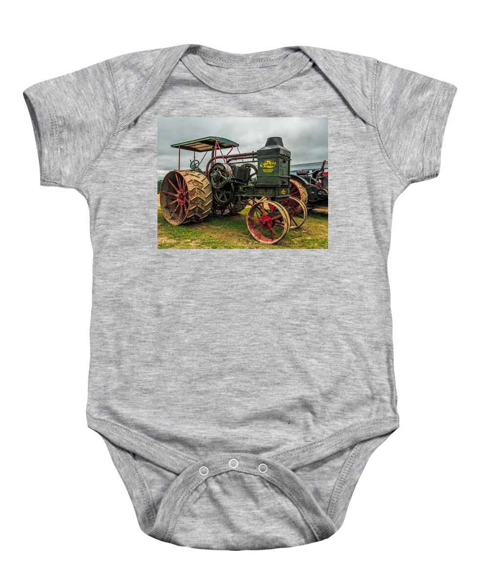 Rumley Baby Onesie featuring the photograph Rumley Oil Pull II by Paul Freidlund
