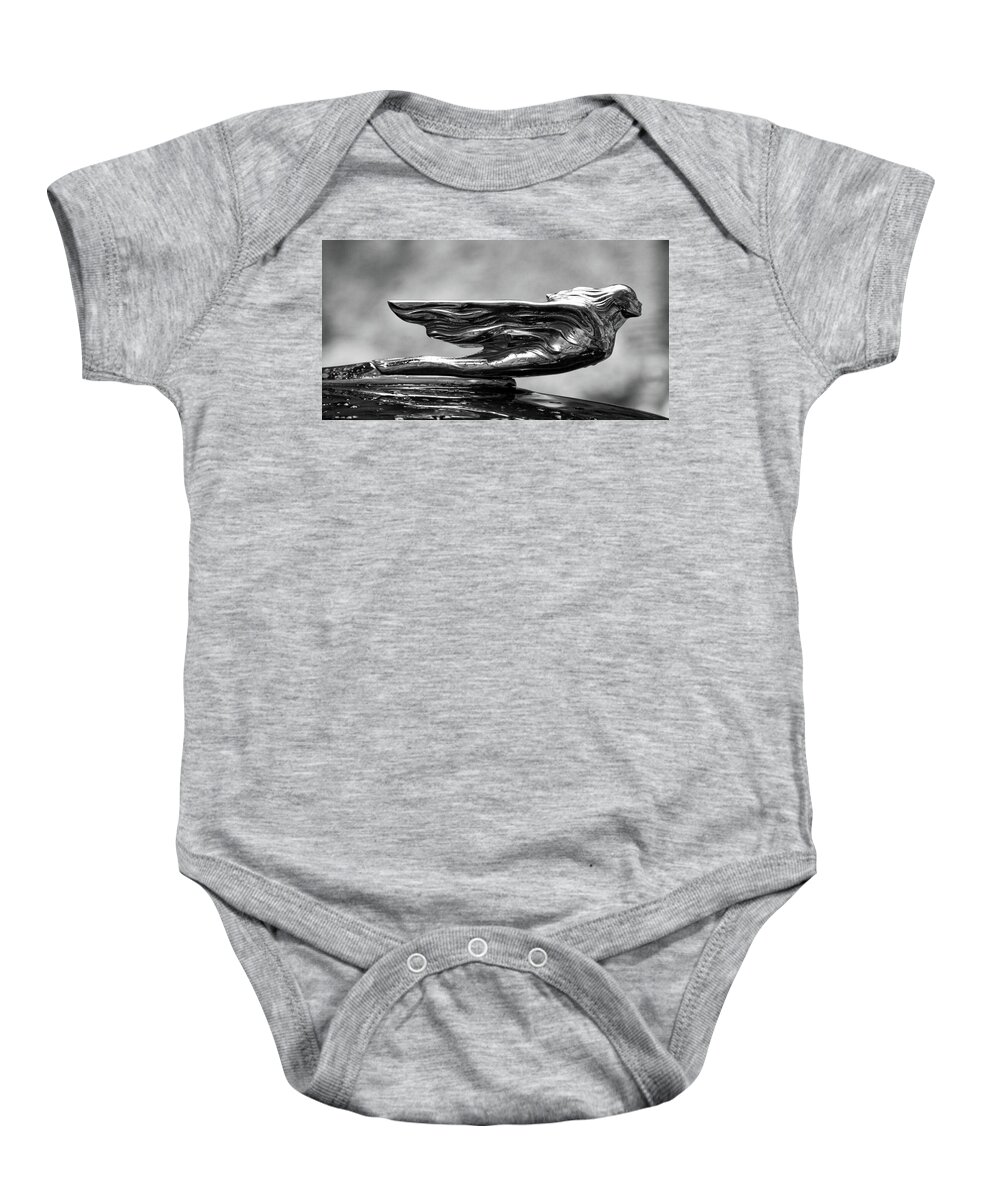 Hood Ornament Baby Onesie featuring the photograph Salvador Dali Cadillac Emblem by Tatiana Travelways