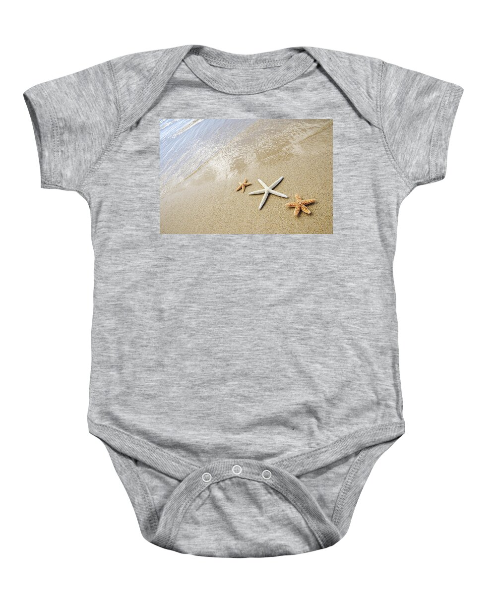 Afternoon Baby Onesie featuring the photograph Seastars on Beach by Mary Van de Ven - Printscapes