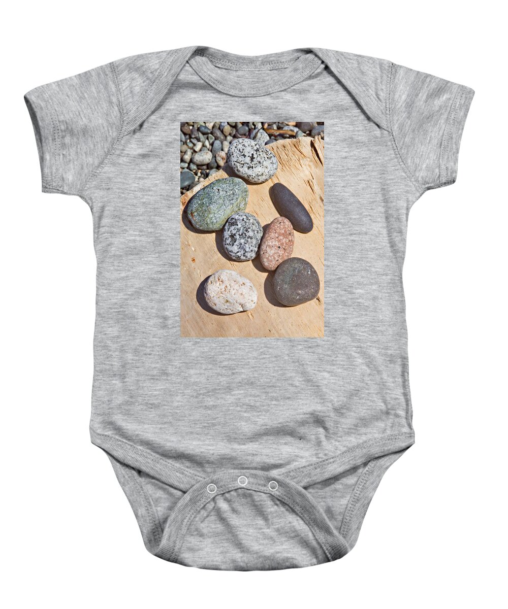 Stones Baby Onesie featuring the photograph Seven Stones on a Log by Peter J Sucy
