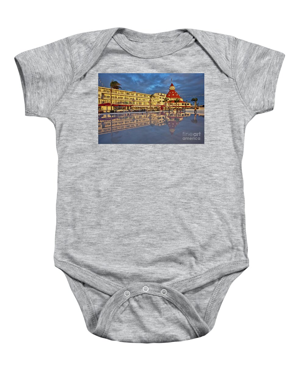 Seaside Baby Onesie featuring the photograph Skating by the Sea at the Hotel del Coronado, California by Sam Antonio