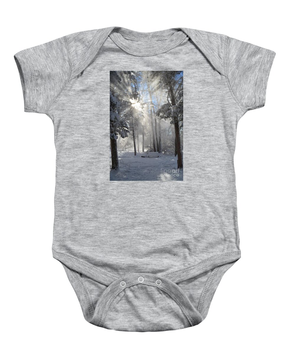 Sunburst Baby Onesie featuring the photograph Snowflakes and Sunbeams by Dani McEvoy