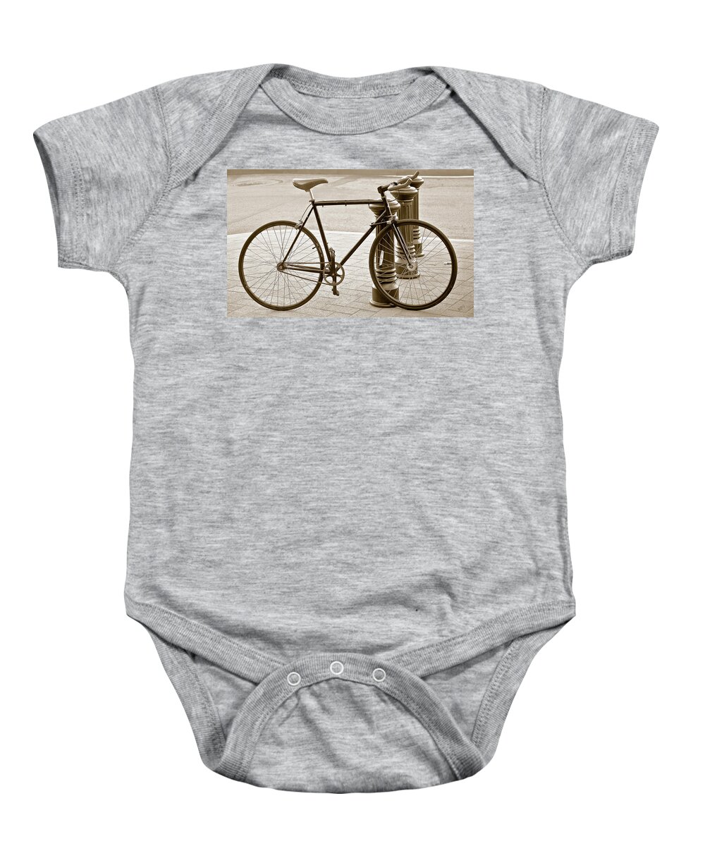 Bicycle Baby Onesie featuring the photograph Still Life With Trek Bike In Sepia by Ben and Raisa Gertsberg
