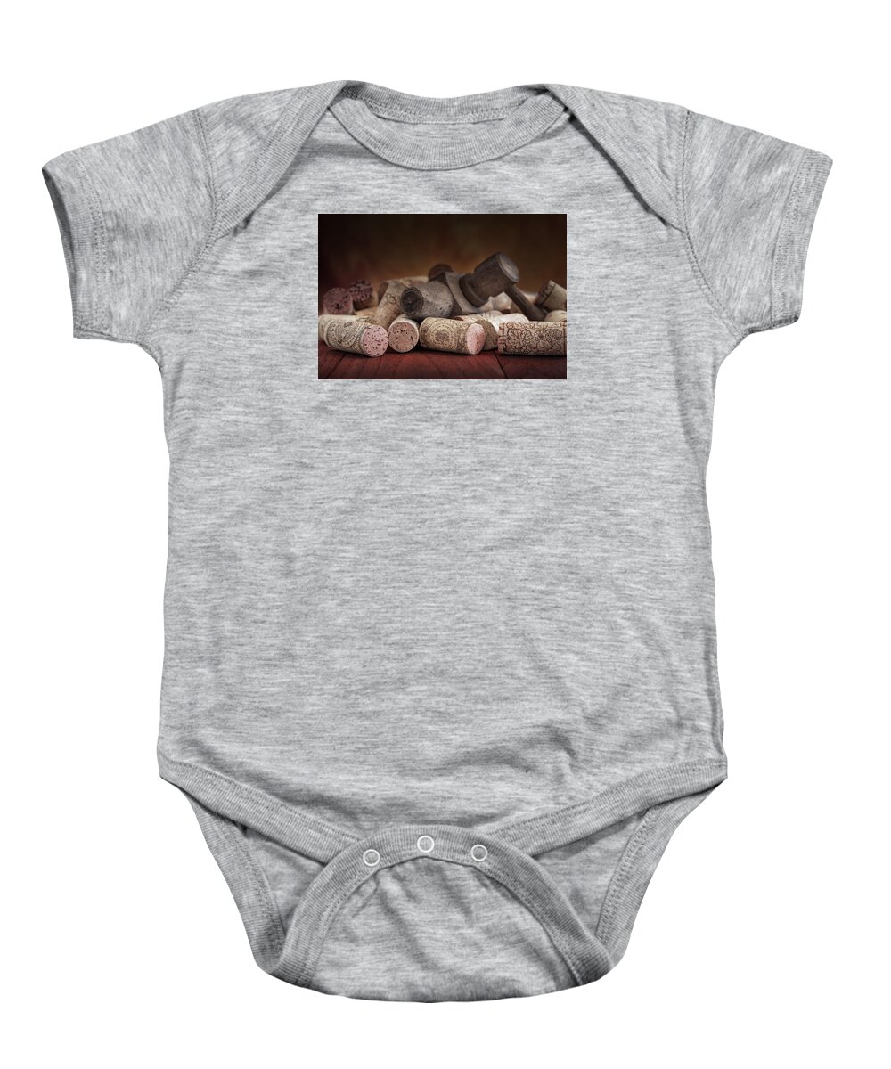 Aged Baby Onesie featuring the photograph Tapped Out - Wine Tap with Corks by Tom Mc Nemar