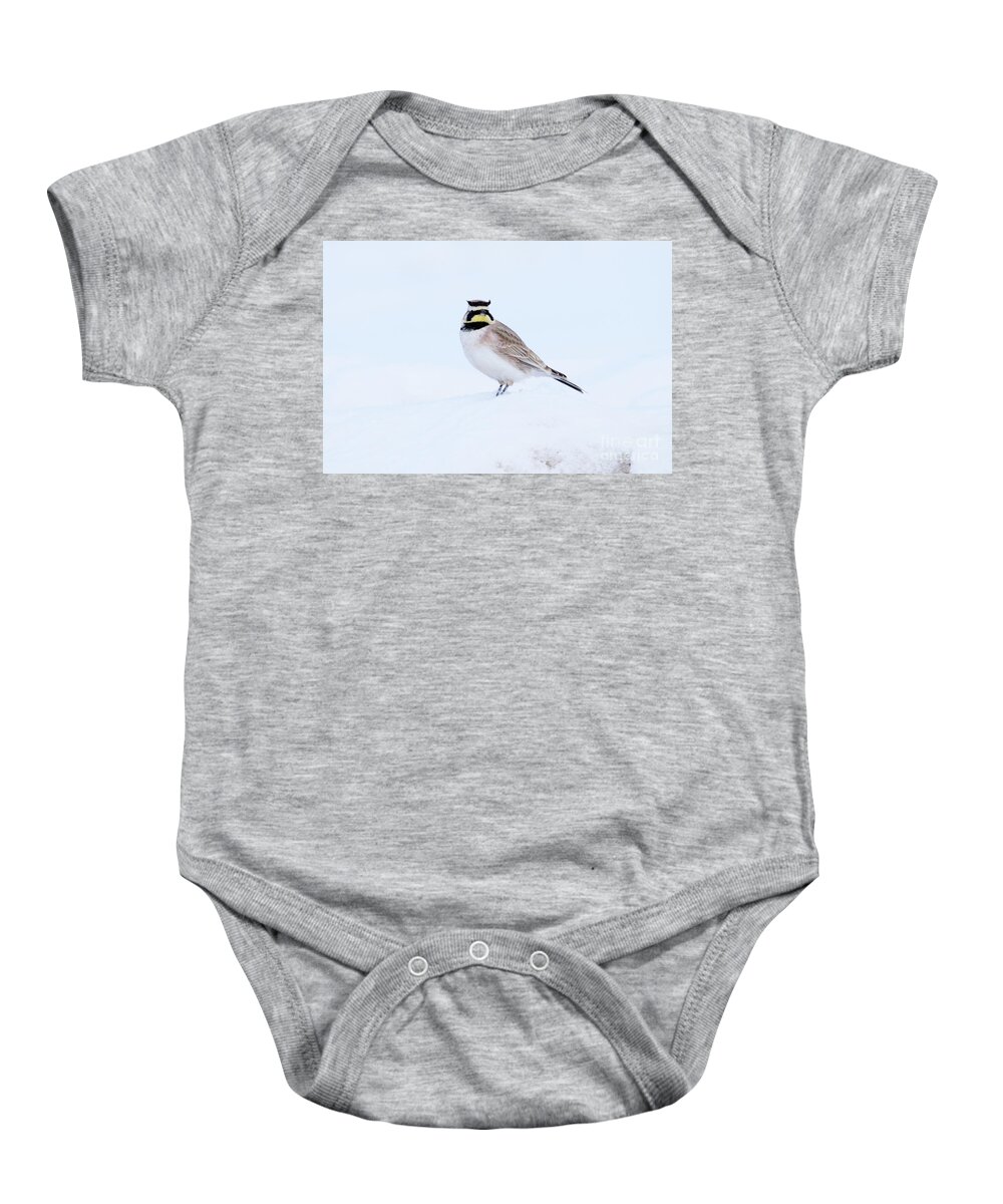 The Warrior Baby Onesie featuring the photograph The Warrior by Alyce Taylor