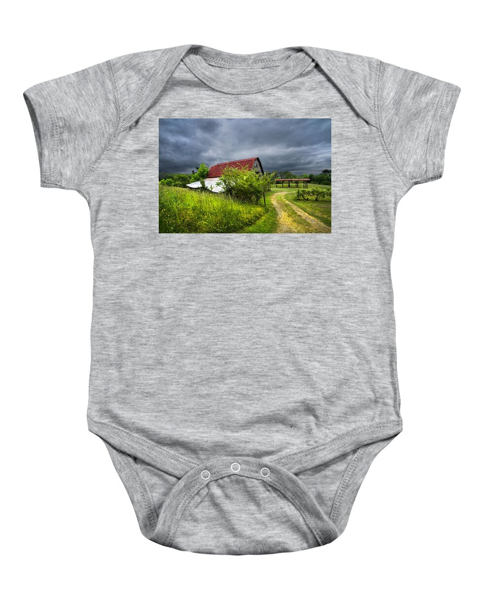 Andrews Baby Onesie featuring the photograph Thunder Road by Debra and Dave Vanderlaan
