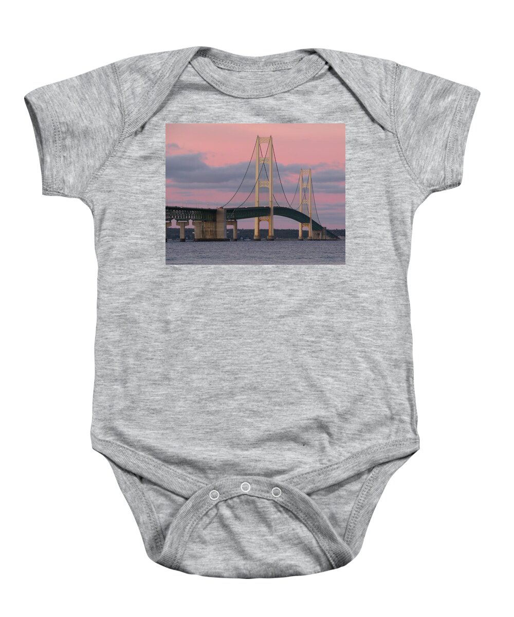 Mackinac Bridge Baby Onesie featuring the photograph Under a Rose Colored Sky by Keith Stokes