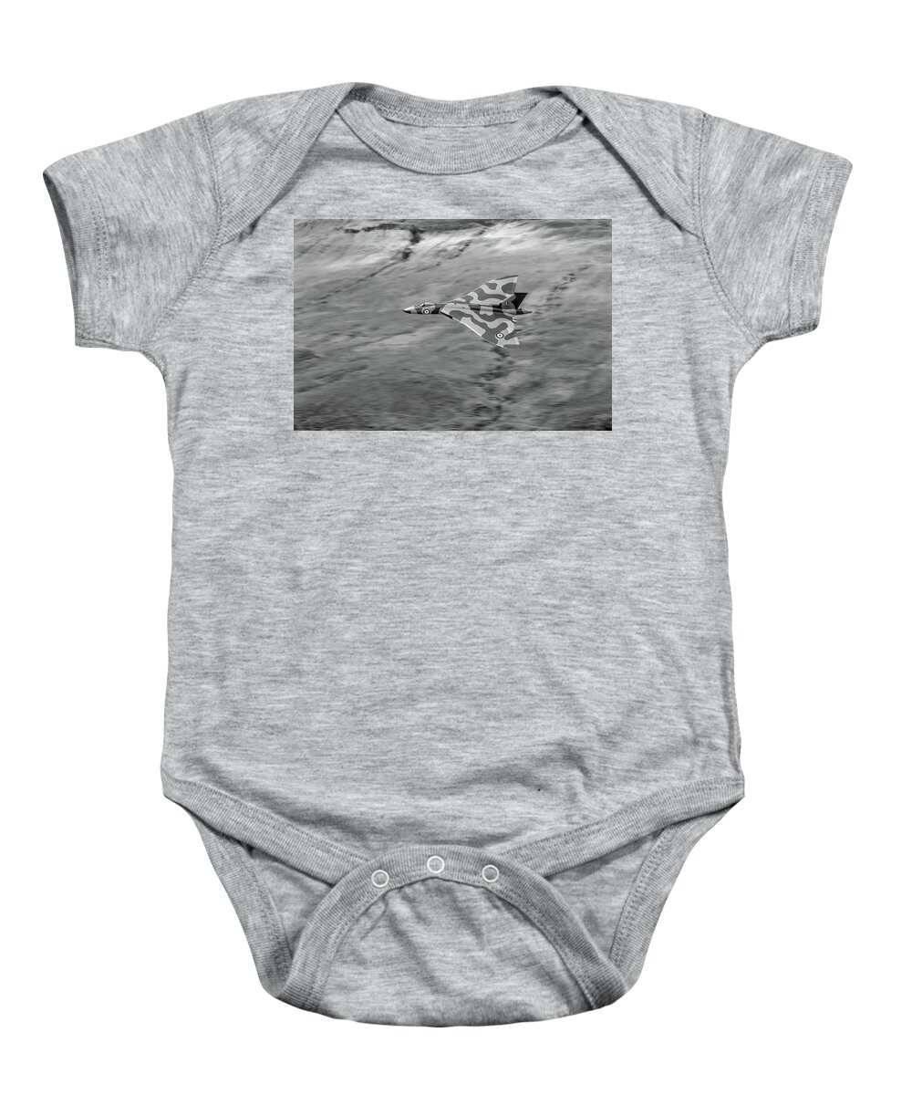 Avro Vulcan Baby Onesie featuring the photograph Vulcan low-level against hillside BW version by Gary Eason