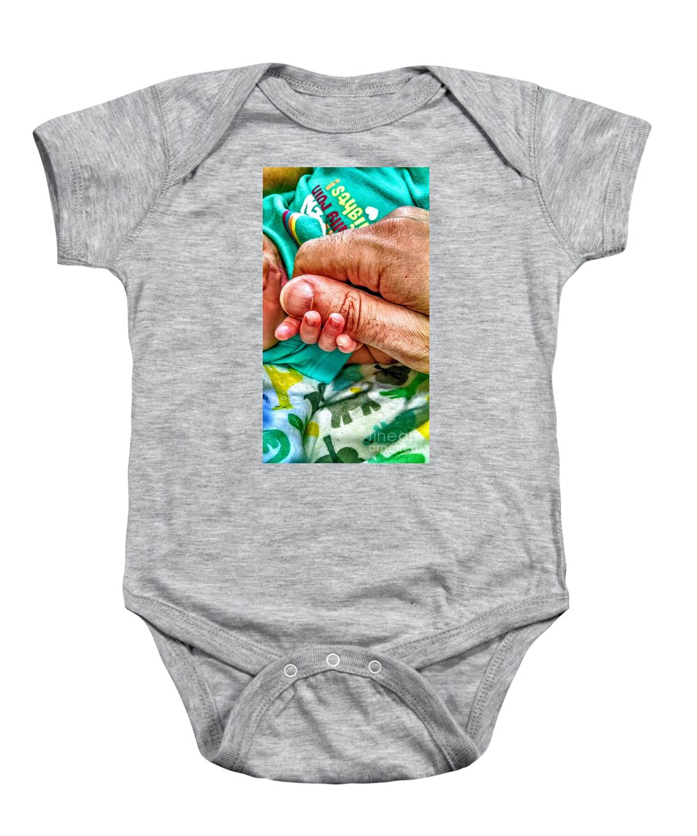 Child Baby Onesie featuring the photograph Worth Holding On To by Christopher Lotito