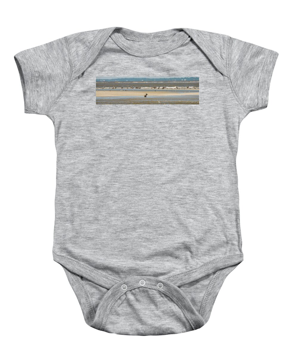 Brown Baby Onesie featuring the photograph Abstract Pelicans In Flight At The Beach Of Atlantic Ocean #5 by Alex Grichenko