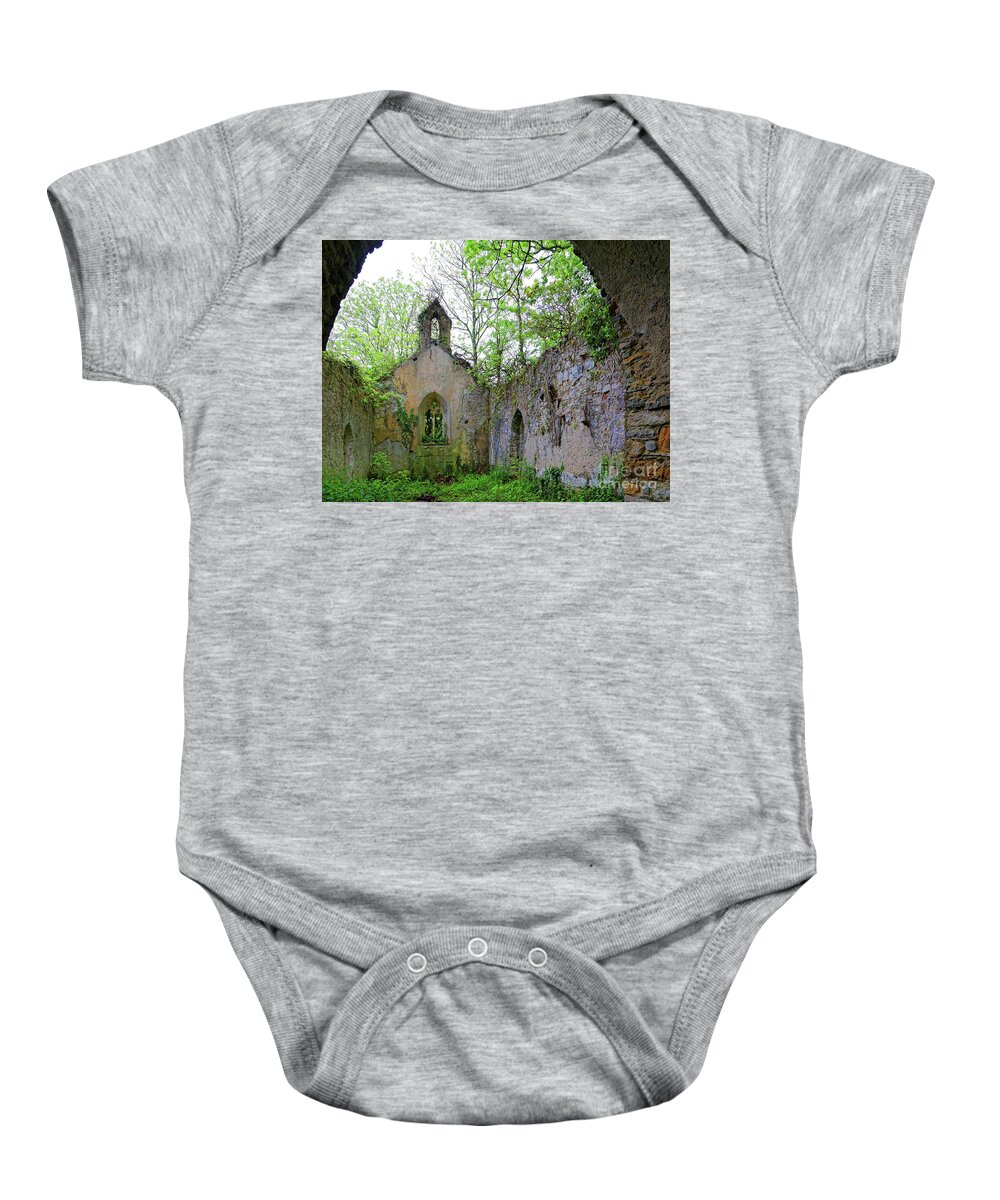 Close Up Baby Onesie featuring the photograph ancient falling down 1400's stone church Wales Great Britain by Robert C Paulson Jr