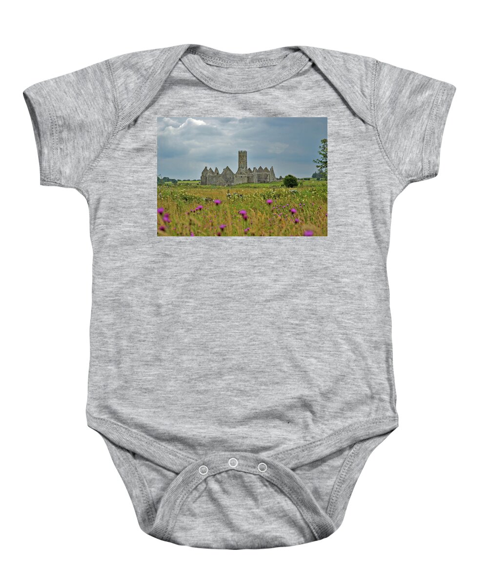 Ireland Baby Onesie featuring the photograph Castle in the Wildflowers by Mark Duehmig