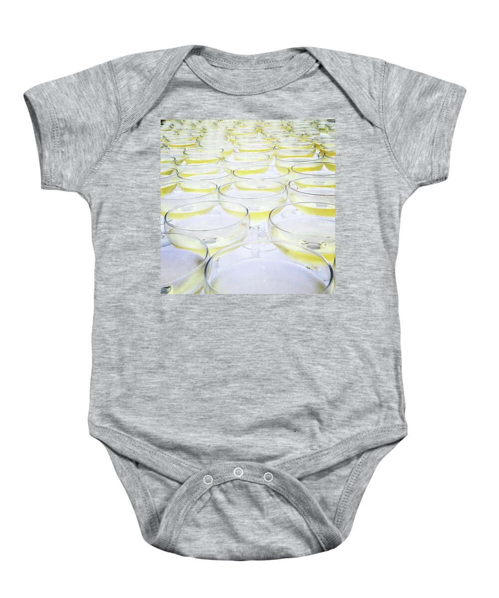 Britain Baby Onesie featuring the photograph Champagne poured and waiting by Seeables Visual Arts