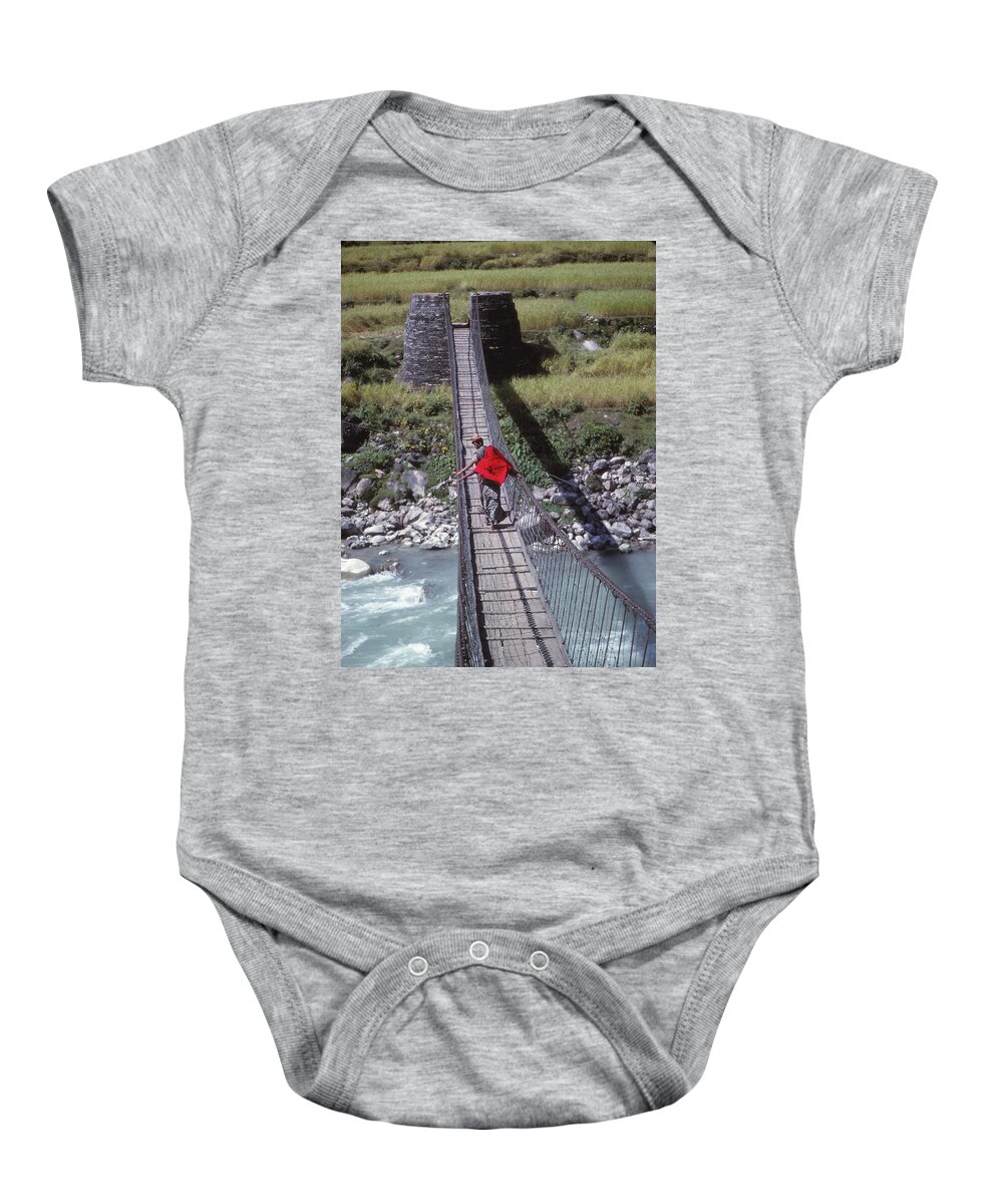 Nepal Baby Onesie featuring the photograph Crossing a suspension bridge by Steve Estvanik