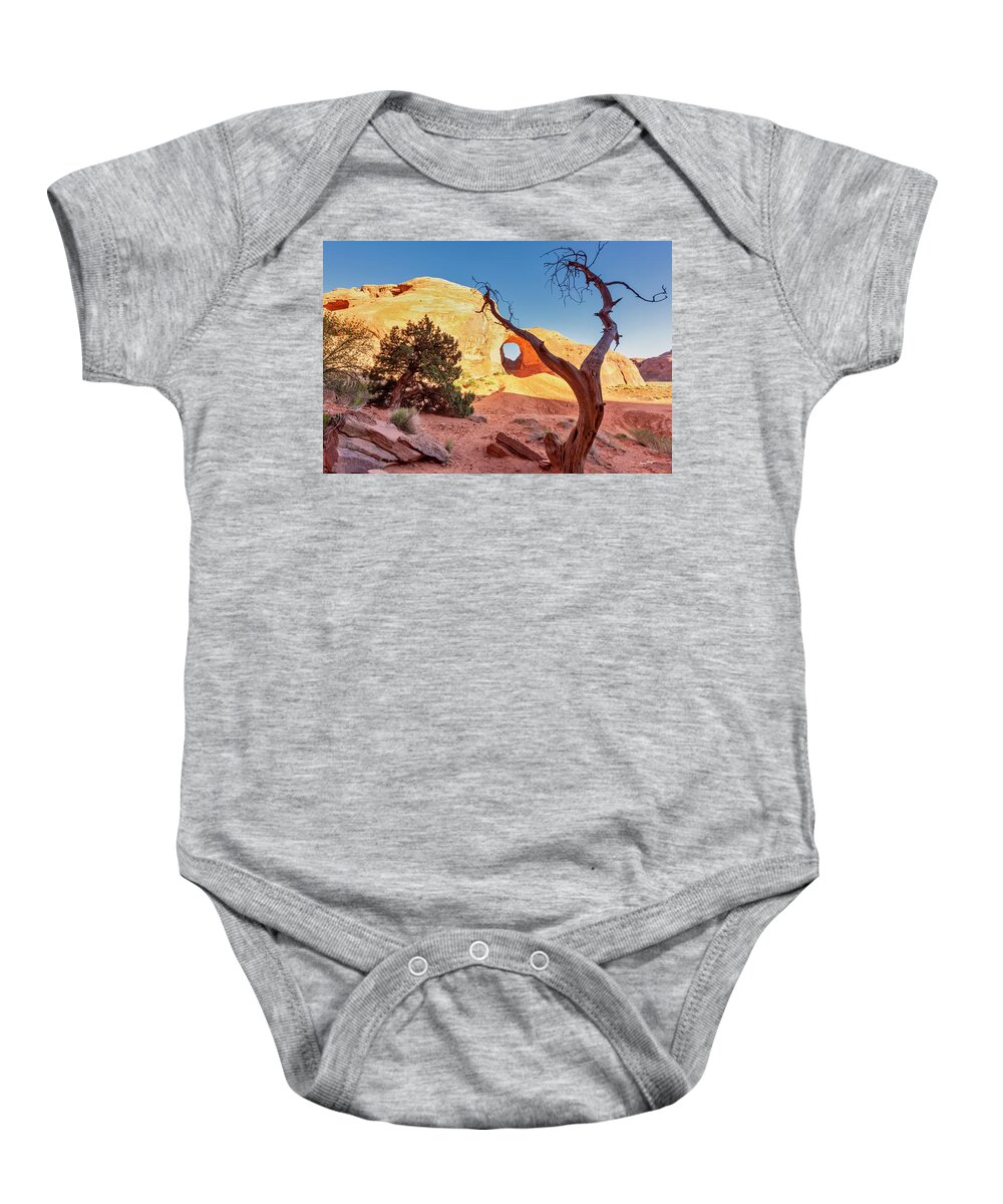 Monument Valley Baby Onesie featuring the photograph Ear Of The Wind by Jurgen Lorenzen