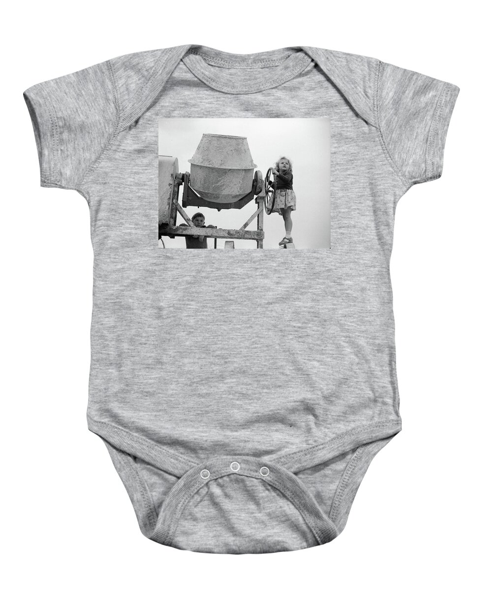 1950s Baby Onesie featuring the photograph Girl at the helm by Jeremy Holton