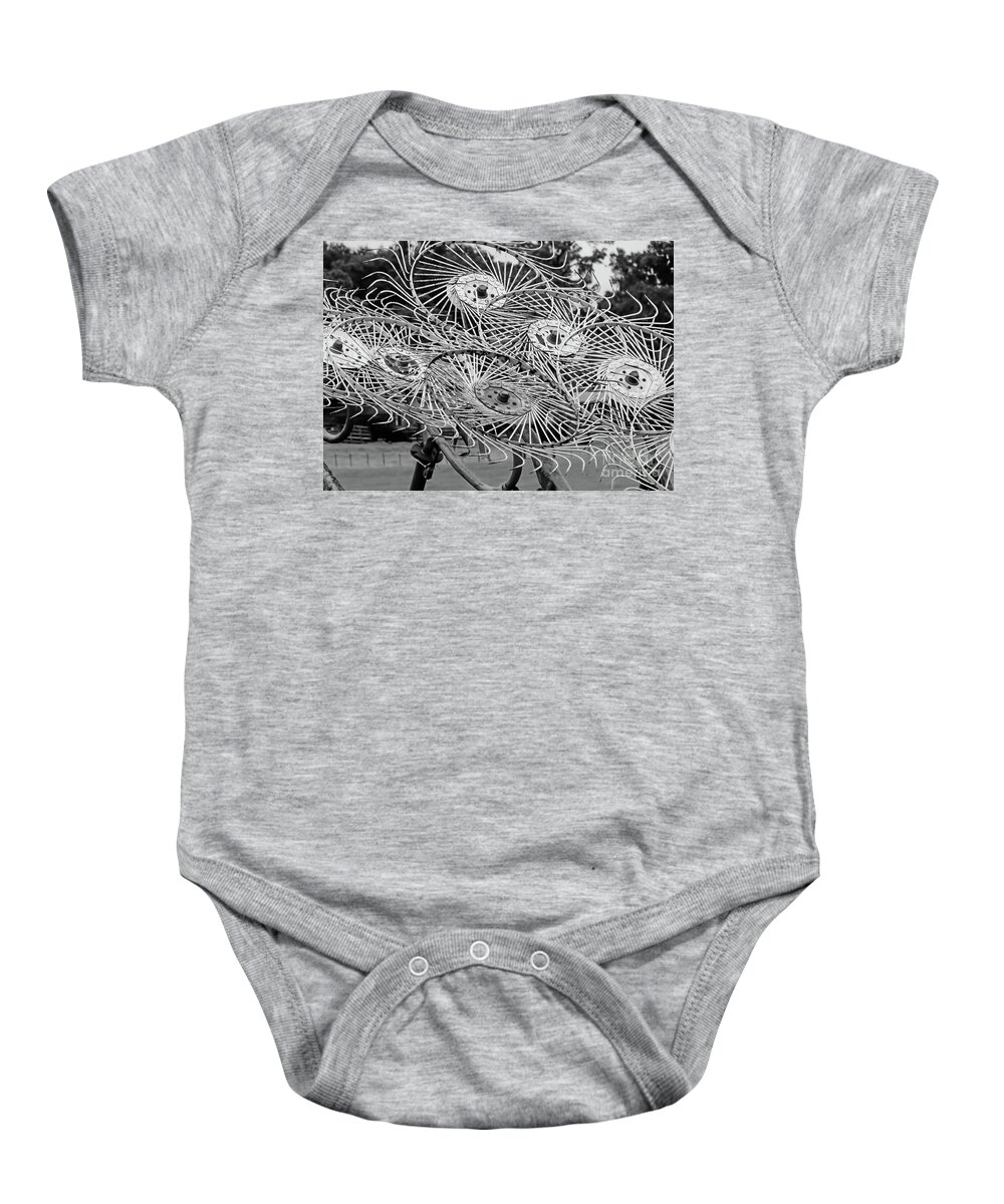 A Wheel Rake Baby Onesie featuring the photograph Hay Rake Black and White by D Hackett