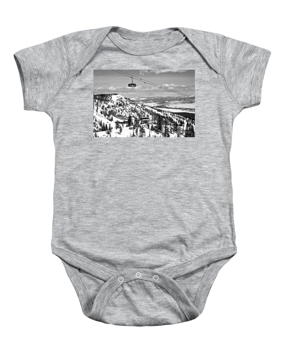 Jackson Hole Baby Onesie featuring the photograph Jackson Hole Big Red Tram In The Tetons Black And White by Adam Jewell