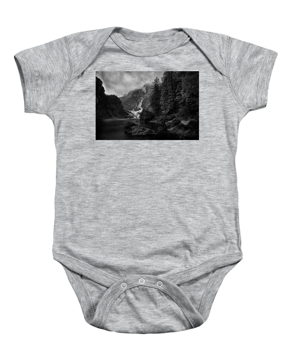  Black And White Baby Onesie featuring the photograph Lake in the Dolomites by Jon Glaser