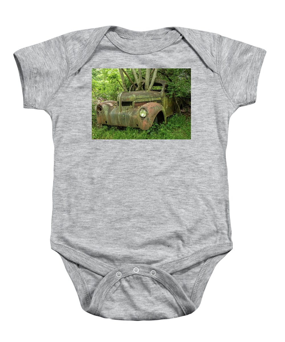 Old Car Baby Onesie featuring the photograph Overgrown by Minnie Gallman