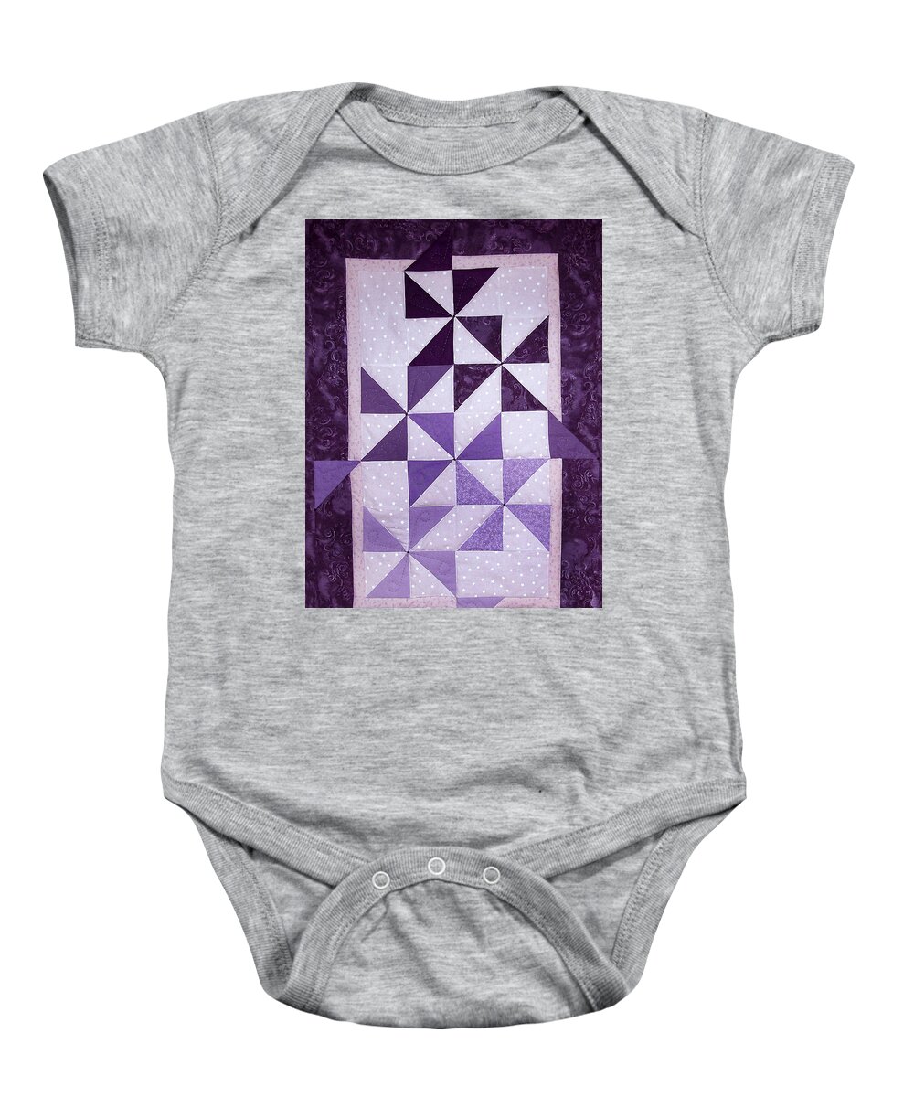 Art Quilt Baby Onesie featuring the tapestry - textile Purple Pinwheels Pirouetting by Pam Geisel
