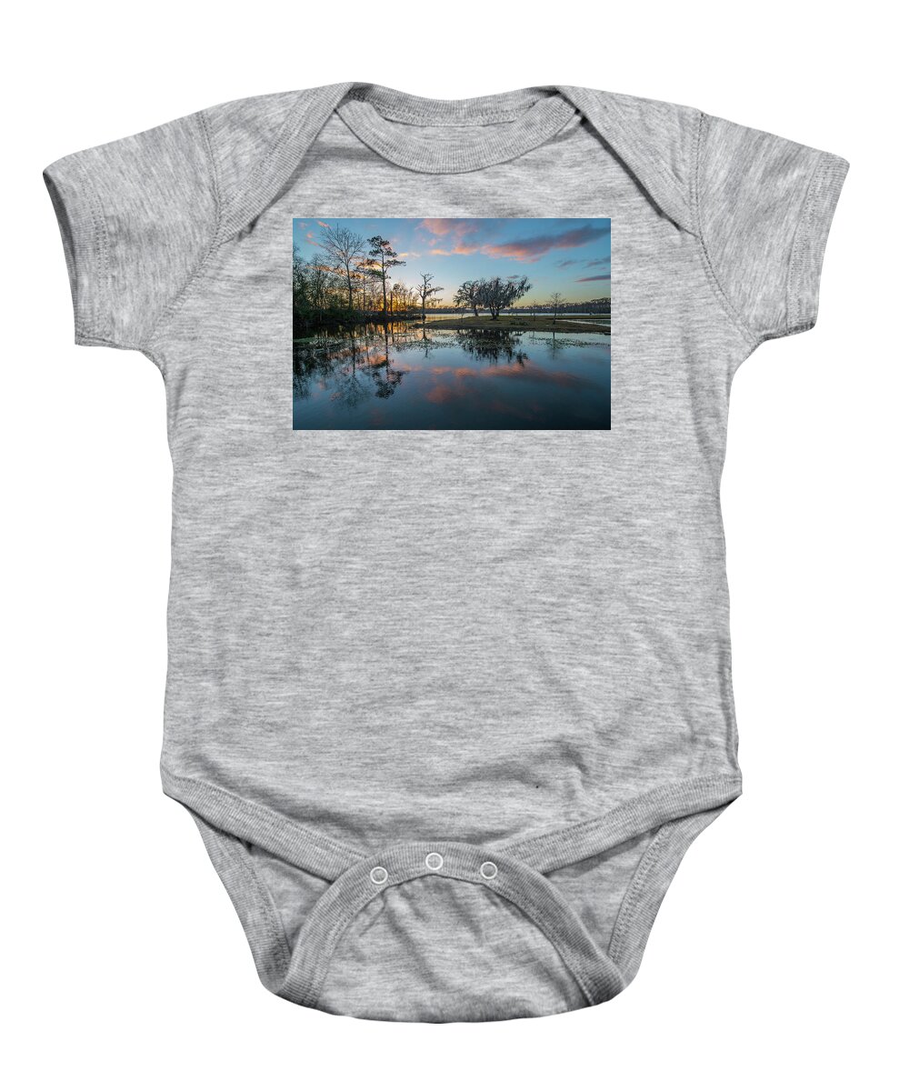 Louisiana Baby Onesie featuring the photograph Quiet River Sunset by Tom Gresham