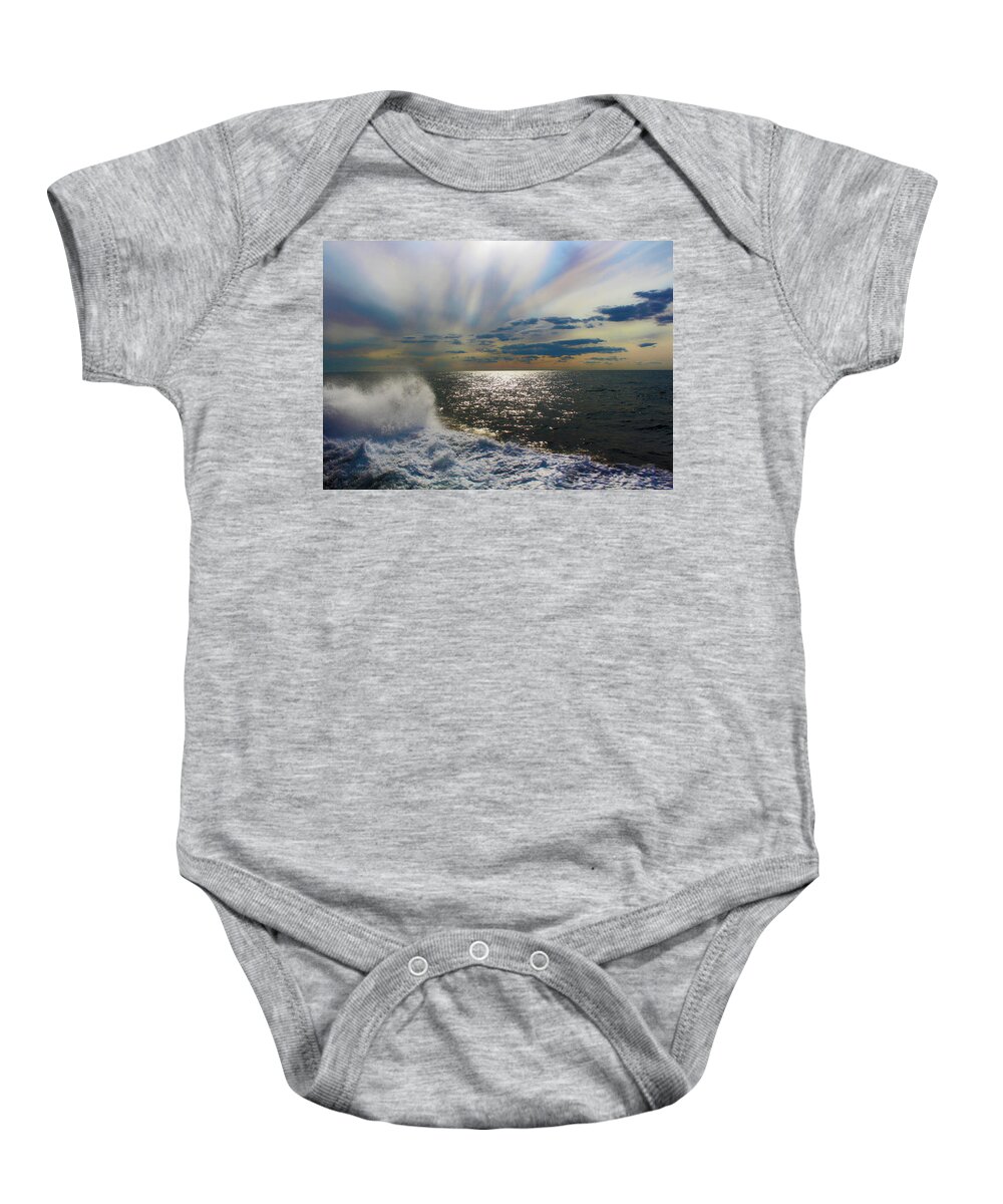 The Ocean Stirs The Heart Baby Onesie featuring the photograph The Ocean Stirs The Heart by Linda Sannuti