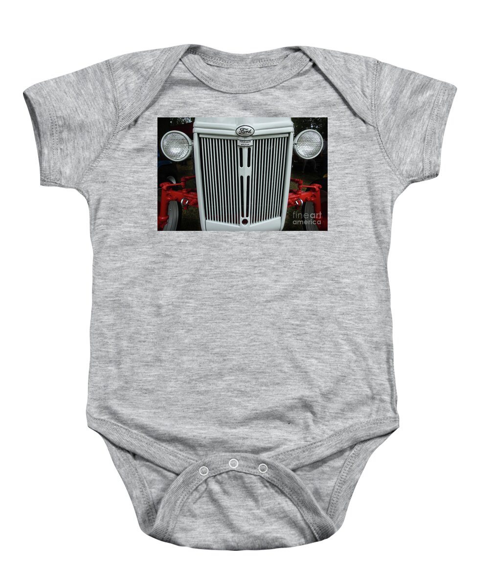 Ford Baby Onesie featuring the photograph Vintage Tractor Front End by Mike Eingle