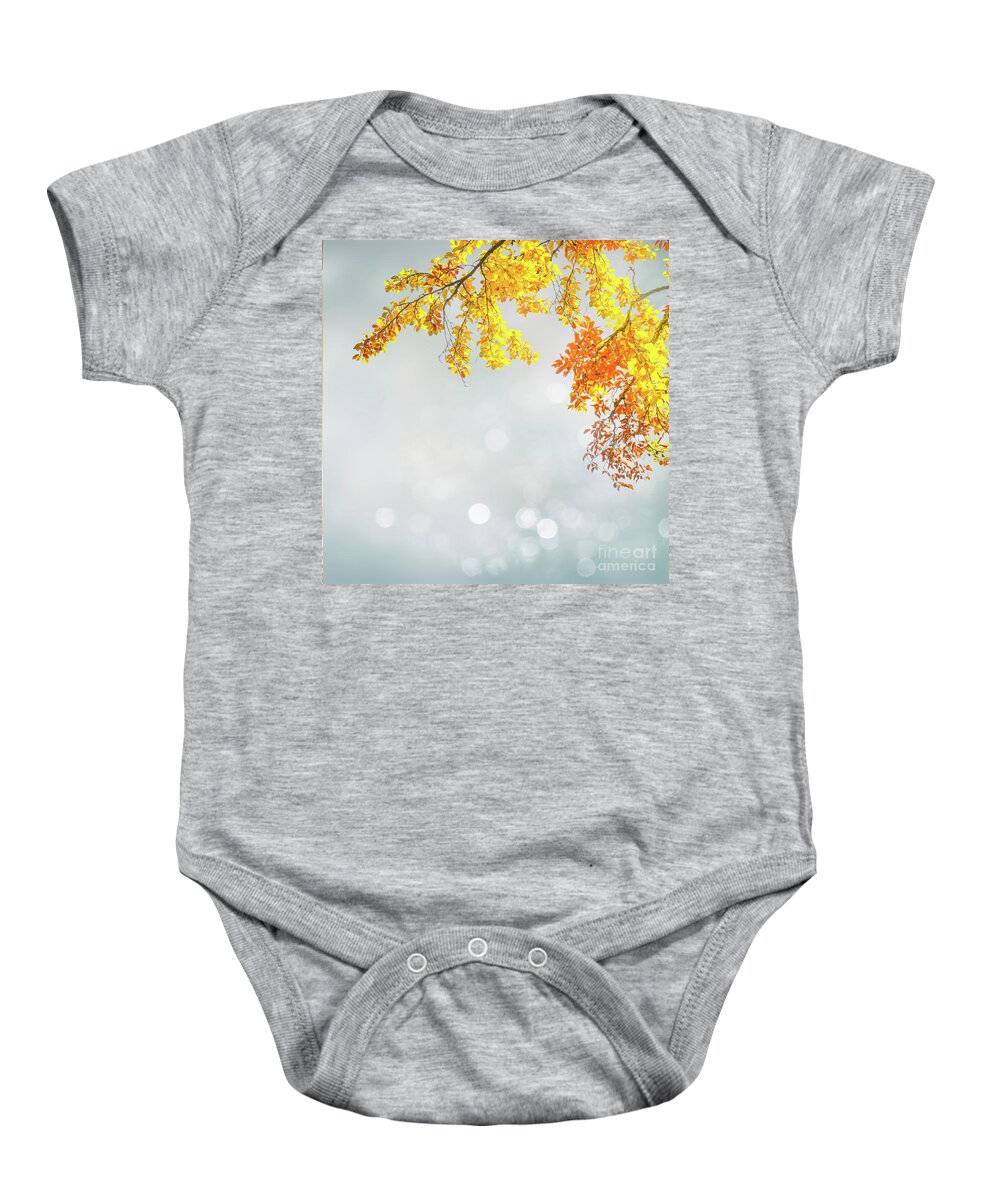 Autumn Baby Onesie featuring the photograph Yellow and Blue Fall by Anastasy Yarmolovich
