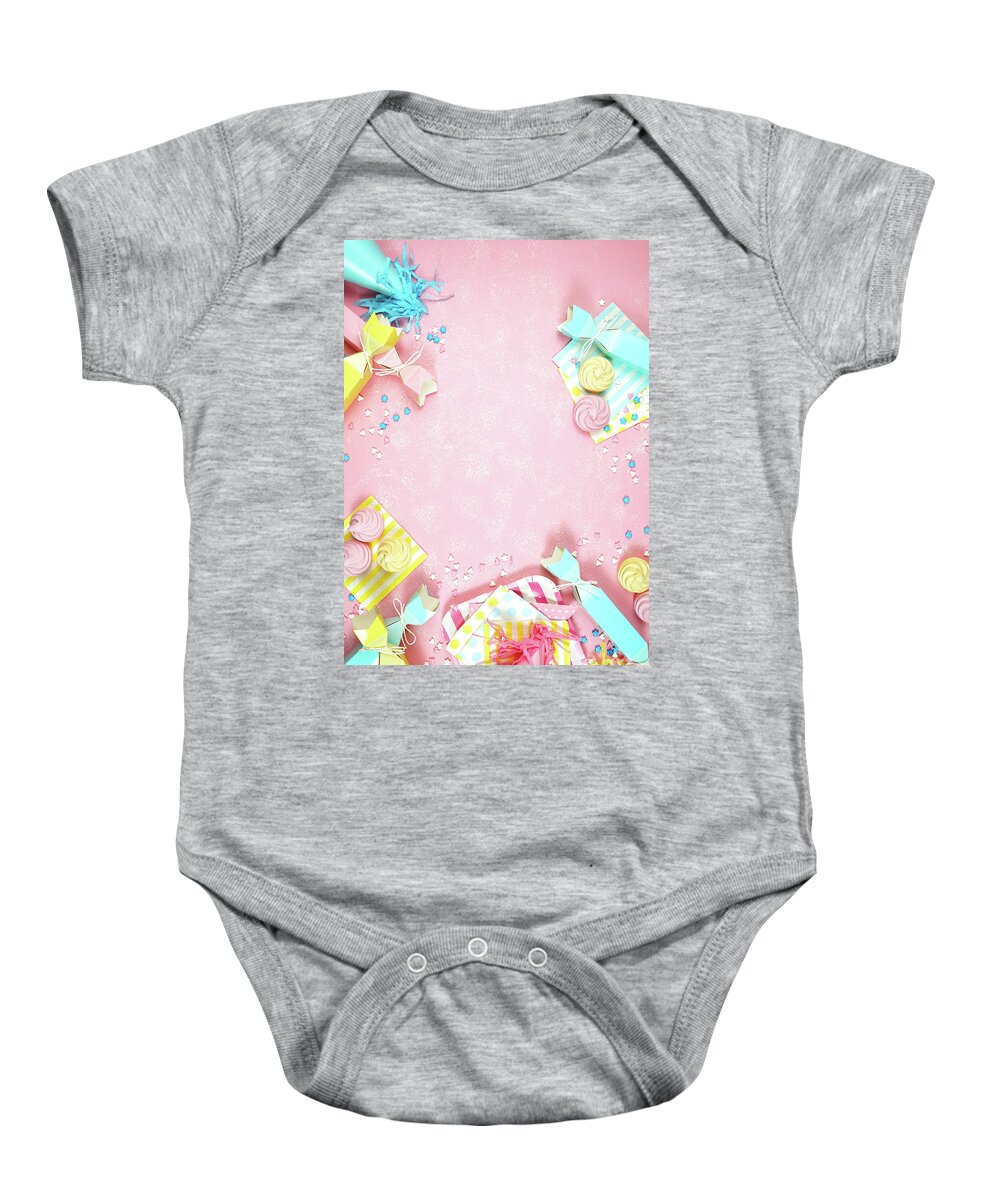 Birthday Baby Onesie featuring the photograph Happy birthday party theme creative layout flat lay with negative copy space. #1 by Milleflore Images