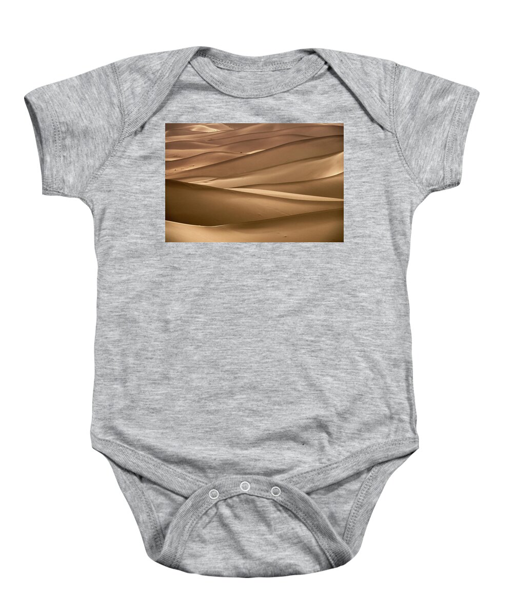 Desert Baby Onesie featuring the photograph Background with of sandy dunes in desert #3 by Mikhail Kokhanchikov