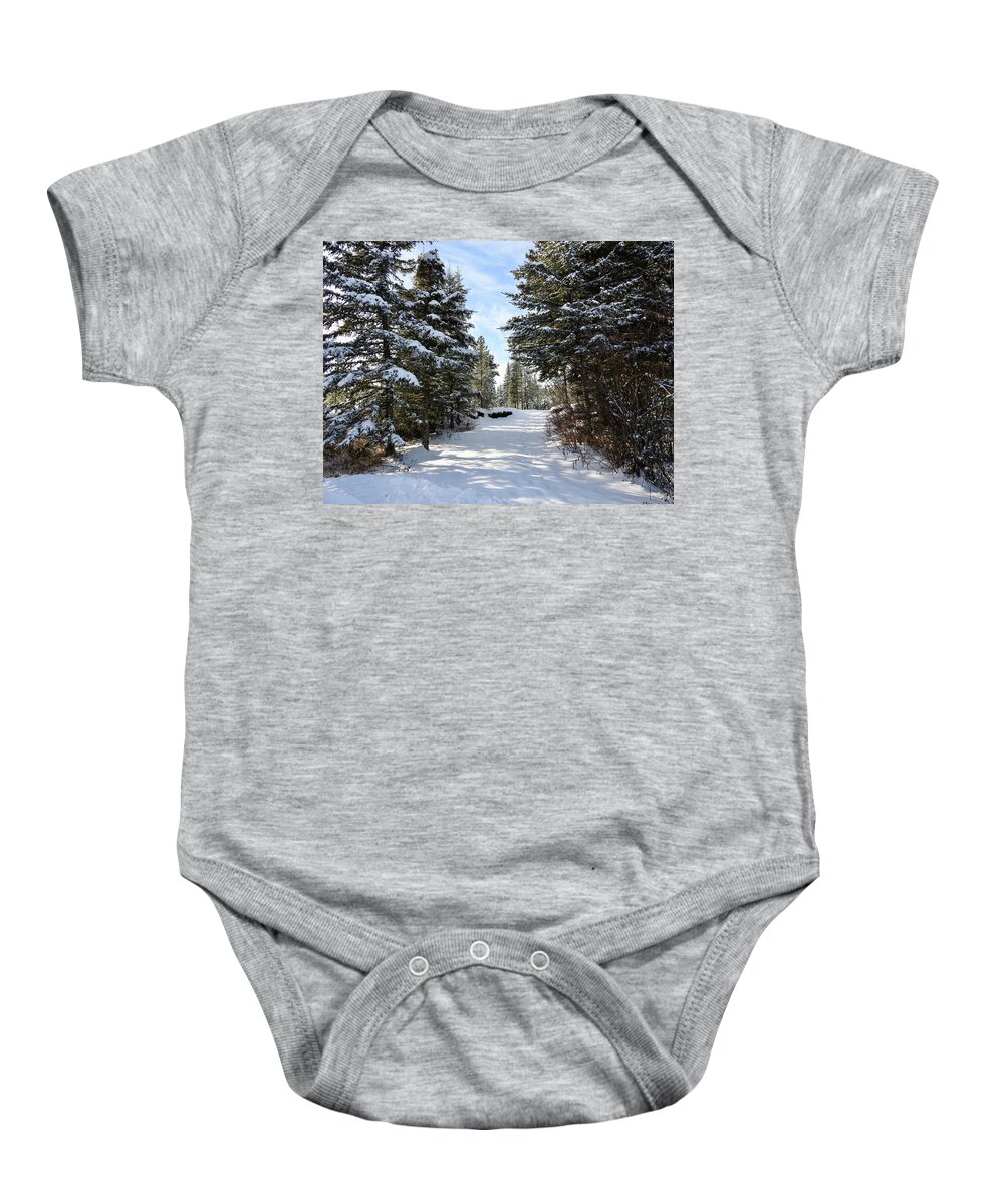 A Winter Trail Baby Onesie featuring the photograph A Winter Trail by Nicola Finch