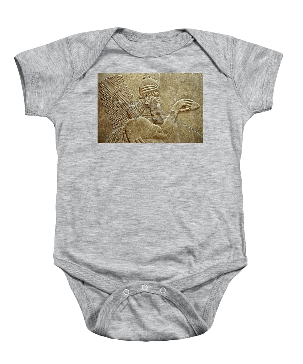 Gene Sculpture Baby Onesie featuring the photograph Assyrian sculpture of a Genie standing - 881-859 B.C Nimrut - Istanbul Archaeological Museum by Paul E Williams