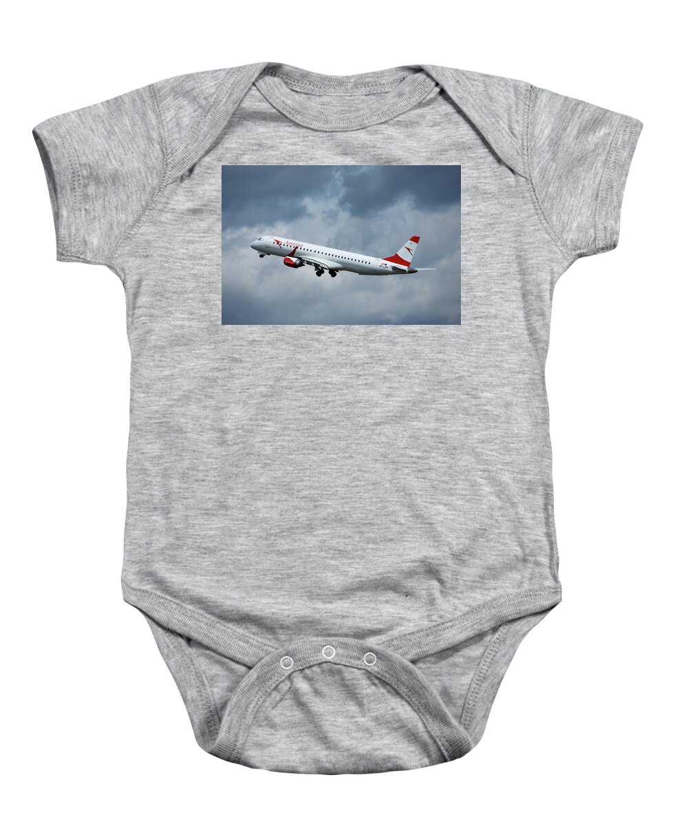 Airplanes Baby Onesie featuring the photograph Austrian Airlines taking off by Ian Middleton