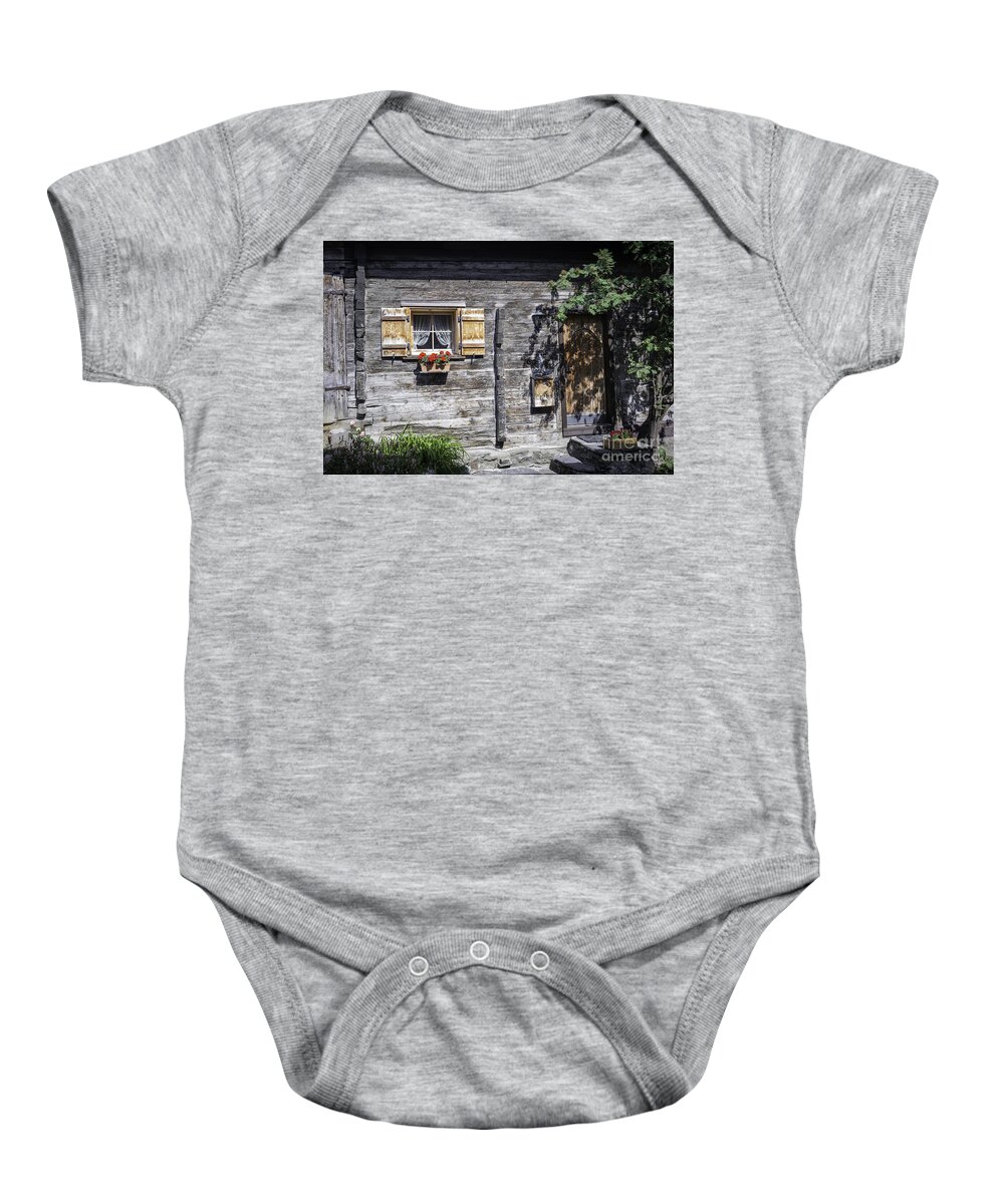 Swiss Wood Cabin Baby Onesie featuring the photograph Berghuette - an original Swiss Chalet by Manuela's Camera Obscura